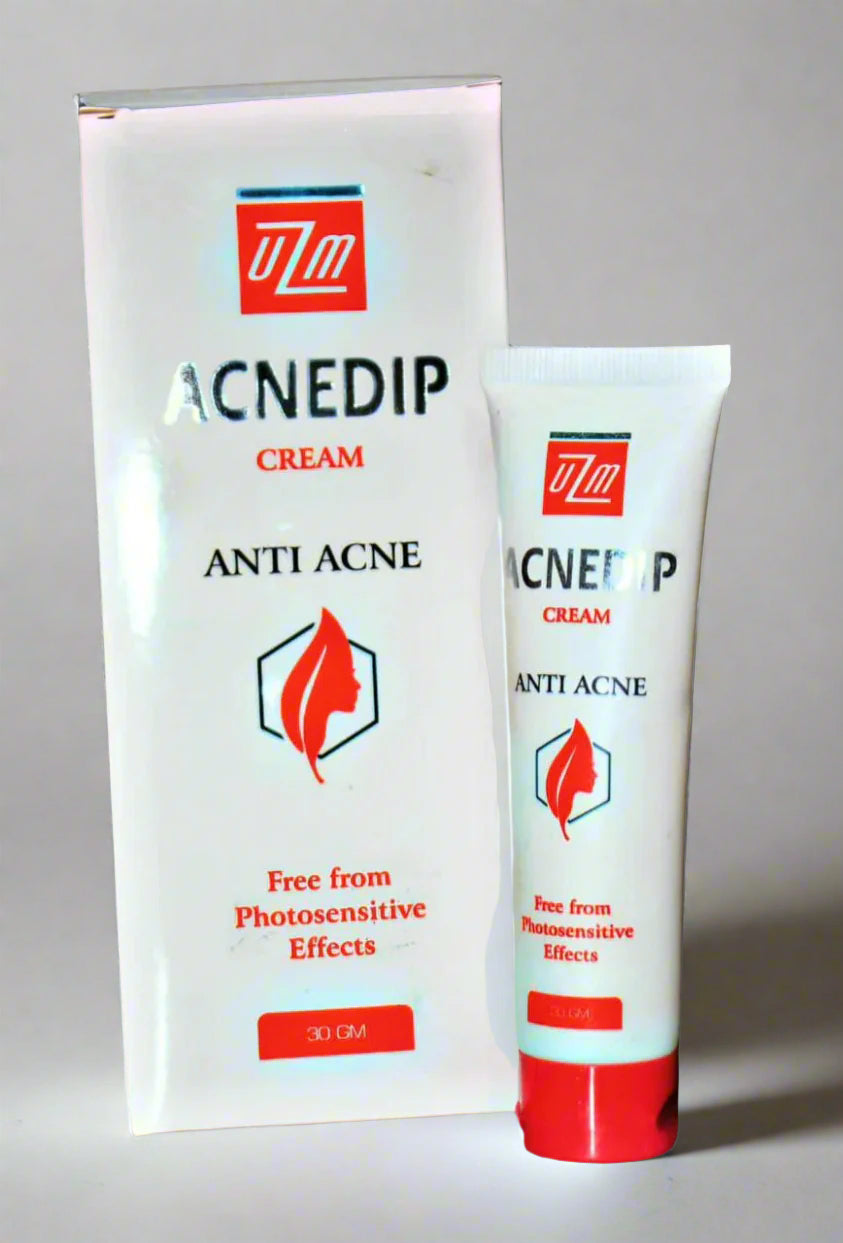 Two tubes of Acnedip Cream with packaging, indicating anti-acne effects.