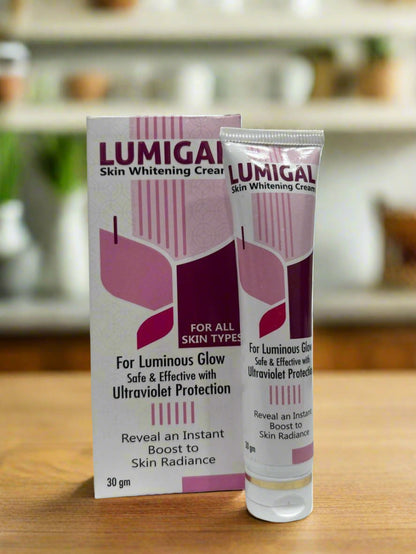 Lumigal skin whitening cream packaging and tube on a white surface
