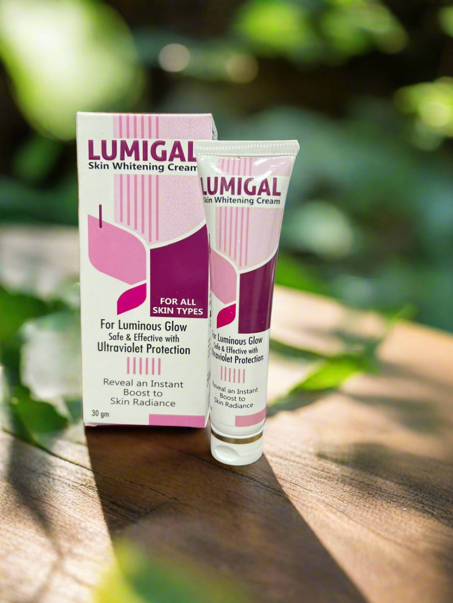 Lumigal skin whitening cream packaging on a wooden surface