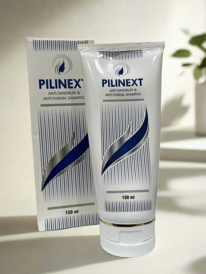 Pilinext shampoo bottle and box on a light surface