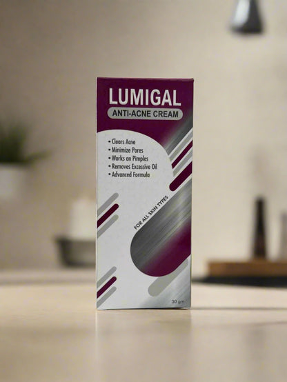 Lumigal anti-acne cream packaging on a white surface with a blurred background