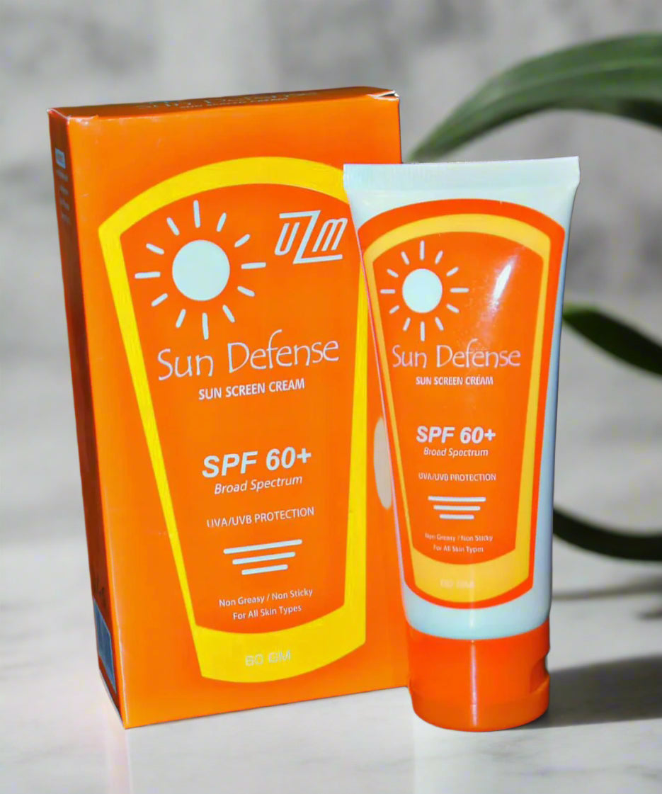 Sun Defense sunscreen cream with SPF 60+ and its packaging on a neutral background